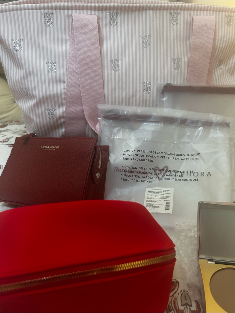 laura mercier Pink and Red Cosmetic Bag Set